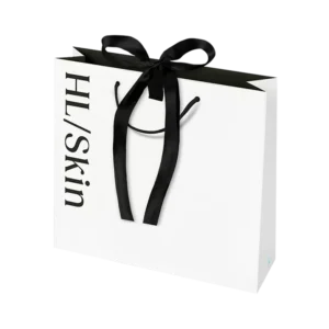 Bolsa de regalo grande HL/Skin blanca con cinta negra, elegante presentación para productos de belleza