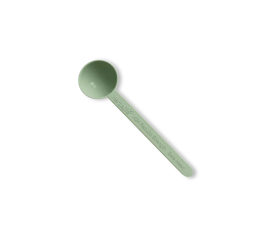 Cuchara medidora verde claro Herbalife para Rebuild Strength.